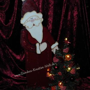 Weihnachtsmann mit Tannenbäumchen1